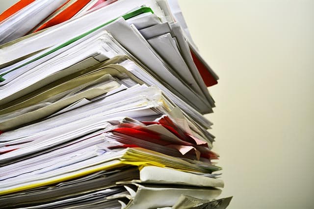 Pile of paper job cards